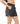 Side pockets on the Alaia women's board short by Maui Rippers in twilight black