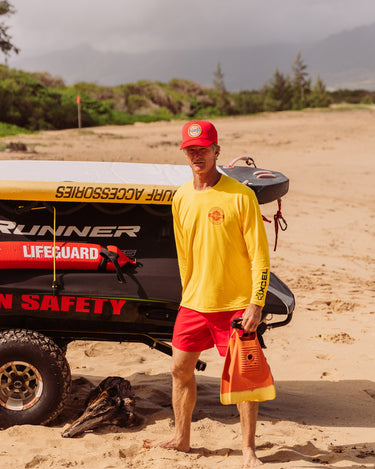 Maui Veteran Lifeguard Ian Mufali wearing the 17" lifeguard short