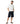 Man with hands in pockets wearing black cotton cargo shorts and black flip flops with a white t shirt