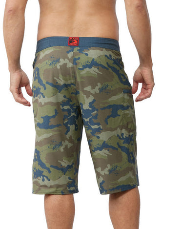Man from the back wearing reef camo 24 inch boardshorts 