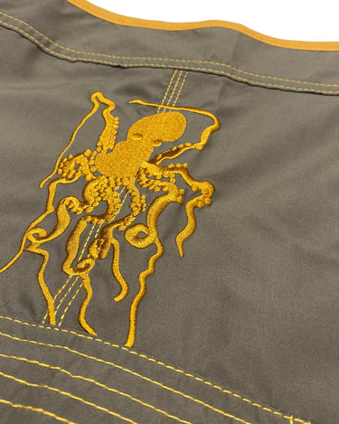 Octopus microfiber fishing boardshorts with vinyl pocket for knife or plyers.