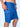 A close-up of a person wearing blue board shorts with a side zip pocket and a blue drawstring, shown against a light blue background.